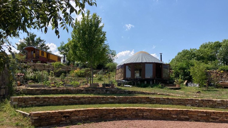 Yurt Workshop yurt in a green summer garden