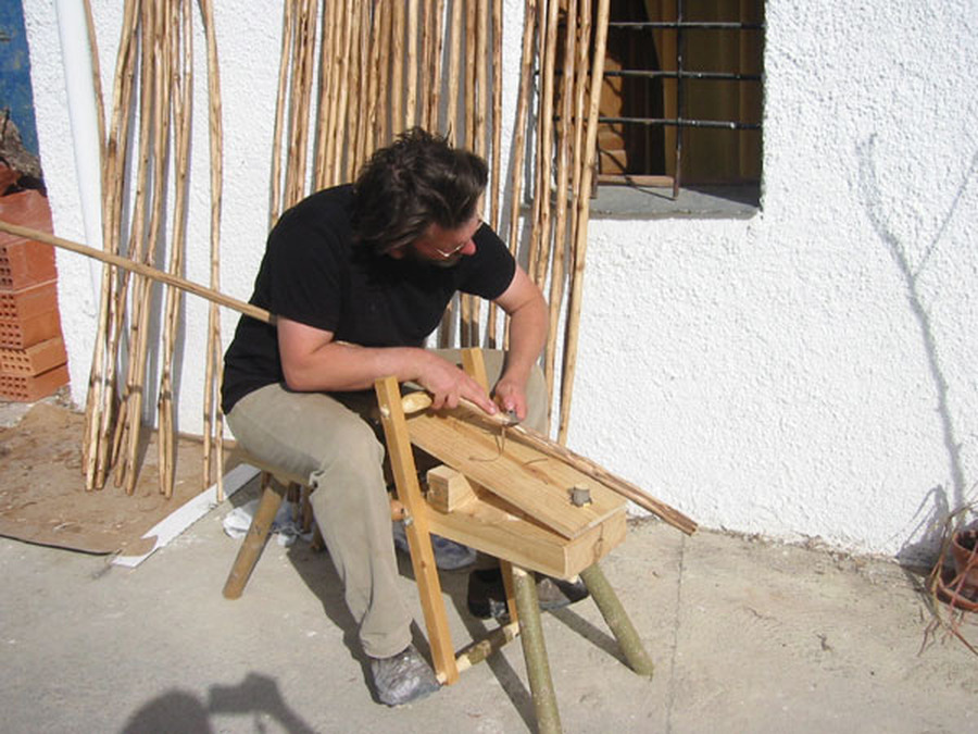 Rob Matthews shaping chestnut yurt poles by hand