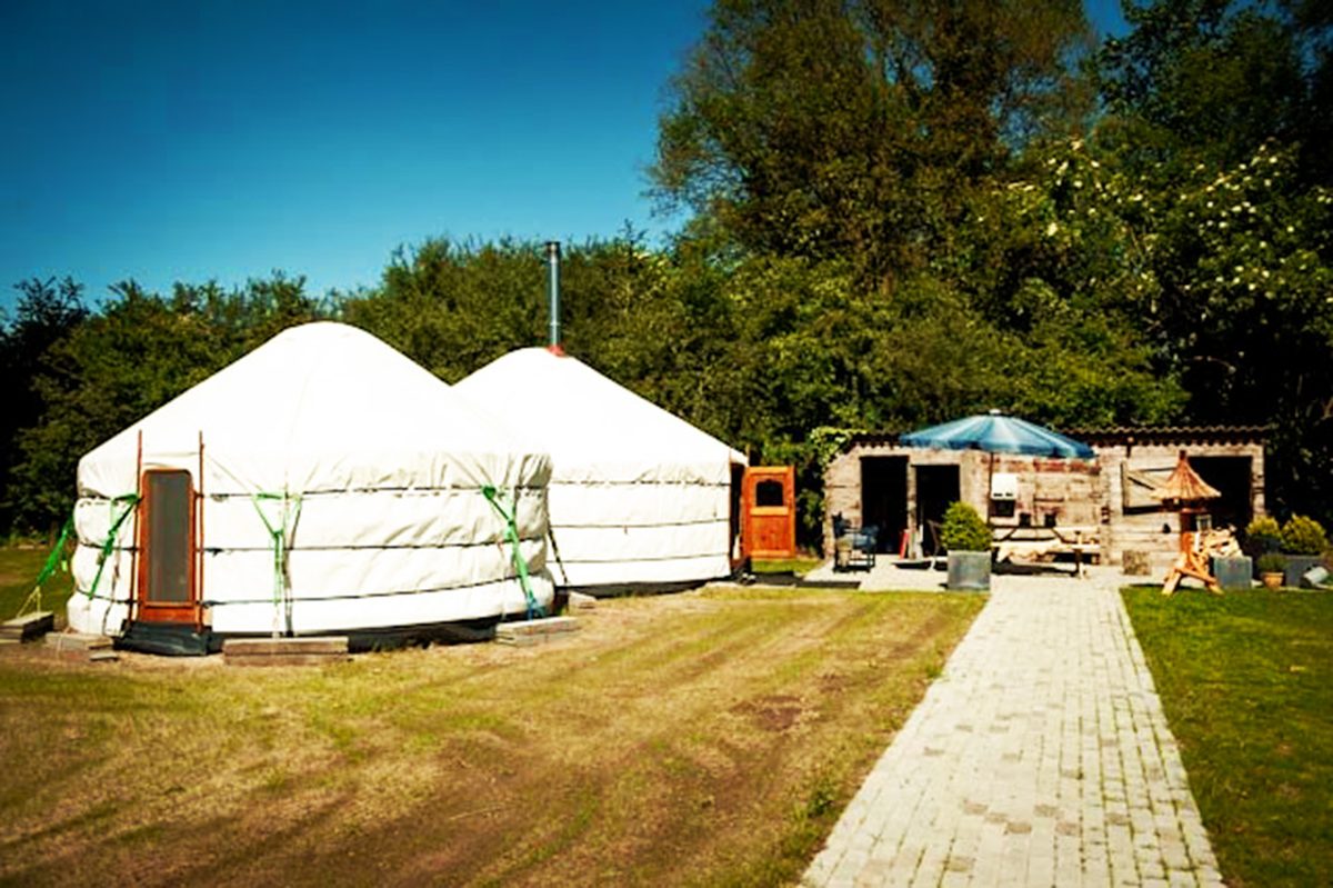 Main yurt connected to a smaller Yurt Pod